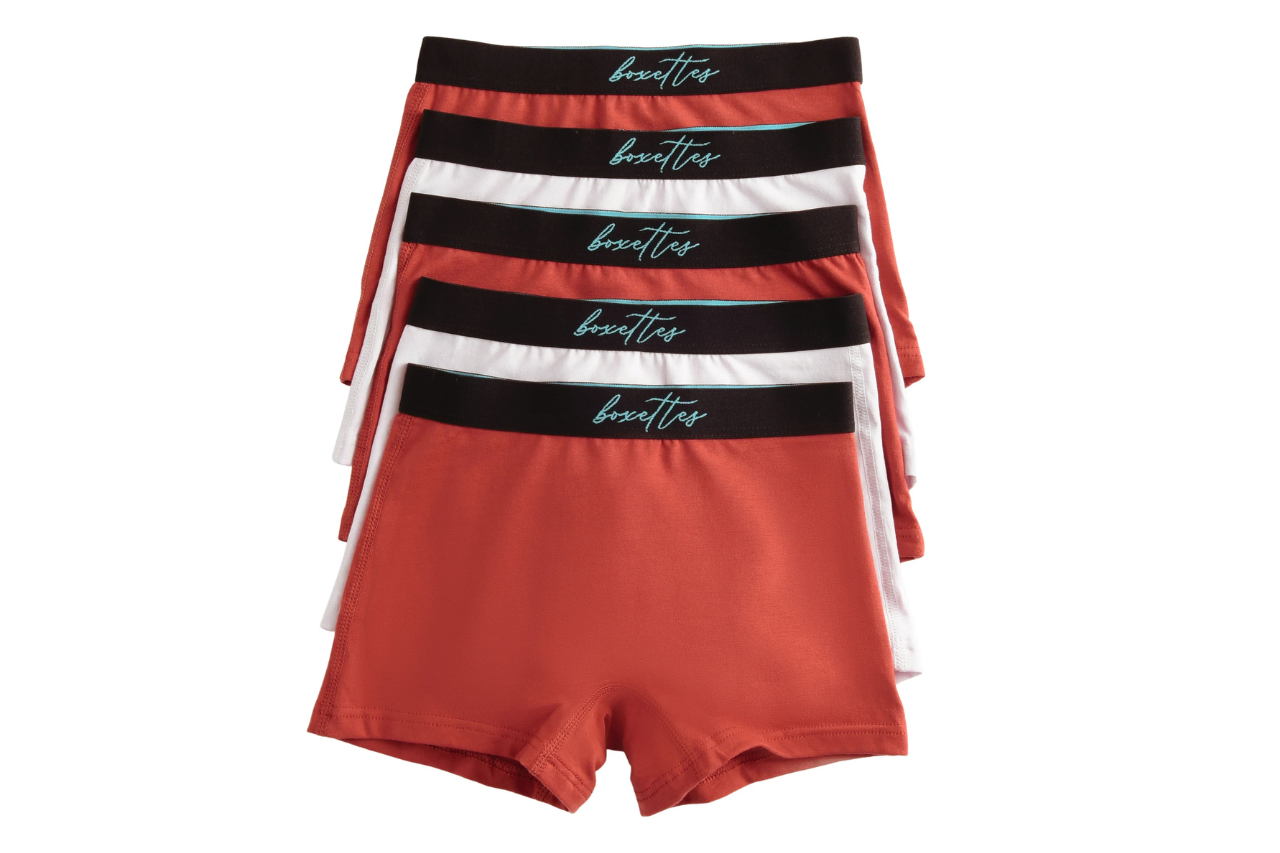 Set of men's underwear with striped waistbands on a white background