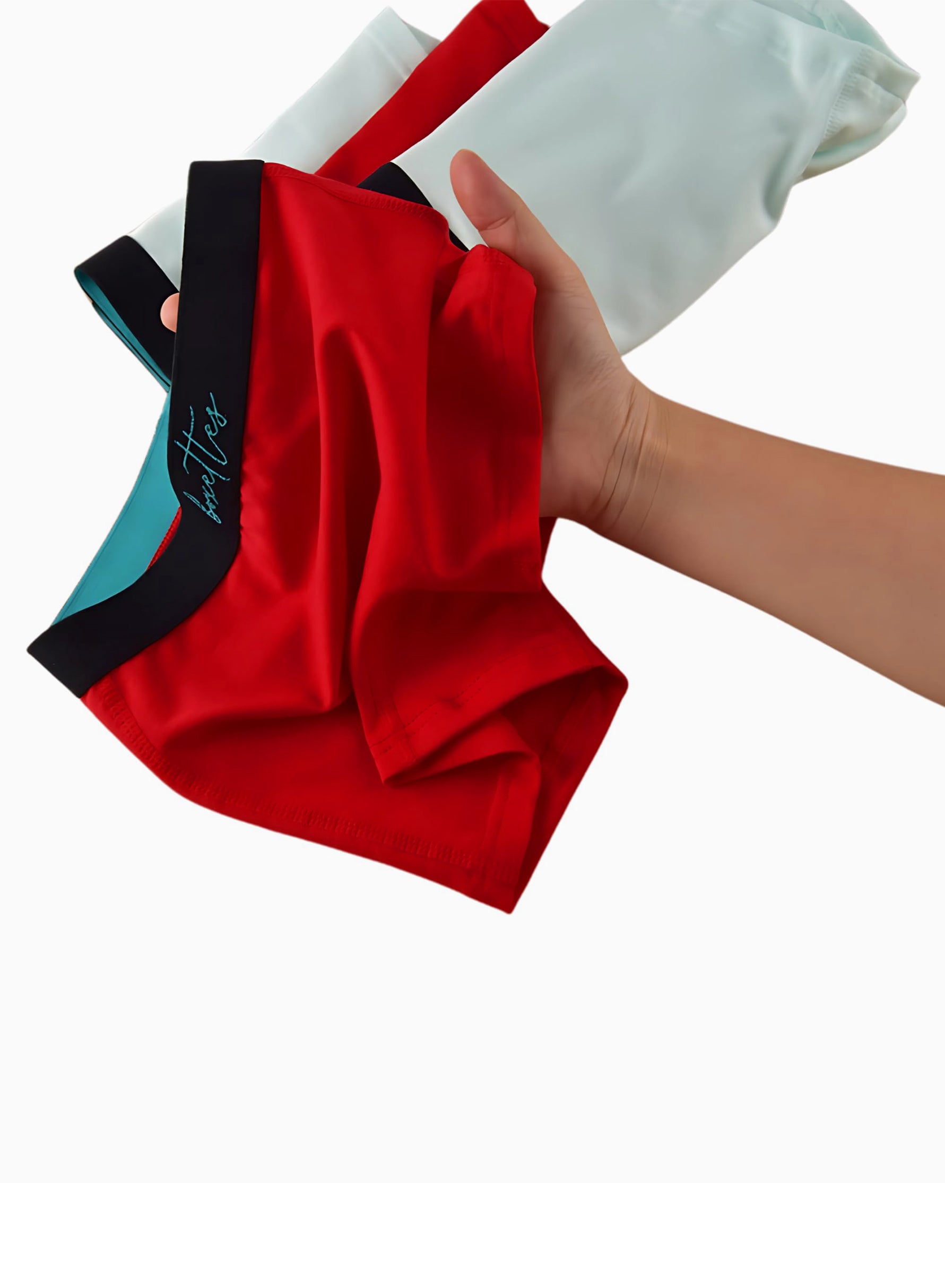 Girls red modal boxer briefs being held in hand by Boxettes